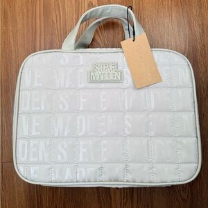 Steve Madden Ivory Quilted makeup bag / compartment